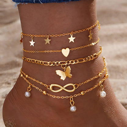 Four-piece women's anklet set with butterfly, pearl, and heart designs in alloy metal