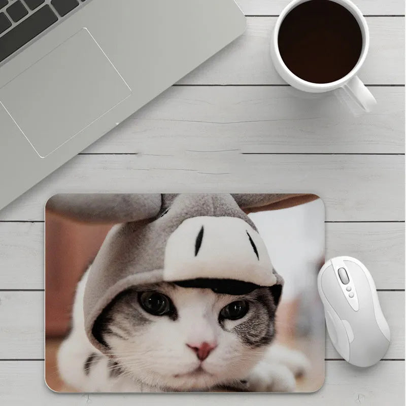 Customisable thick cartoon mouse pad with non-slip base, showing sample patterns like strawberry, cat, and whale designs.