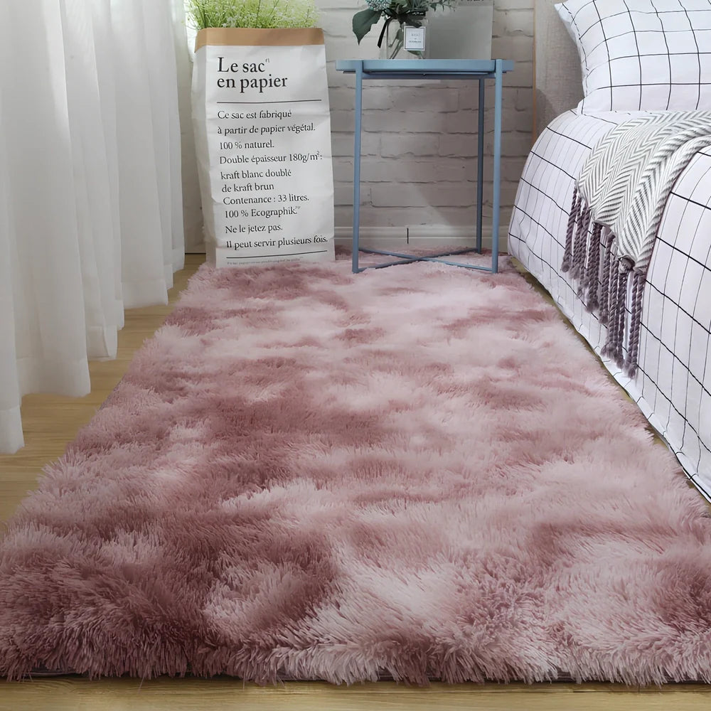 Tie-dyed variegated silk wool carpet floor mat showing organic colour patterns with polyester fibre suede backing