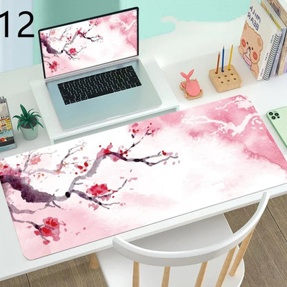 Large gaming mouse desk mat showing printed design on rubber surface with size options up to 400x900mm