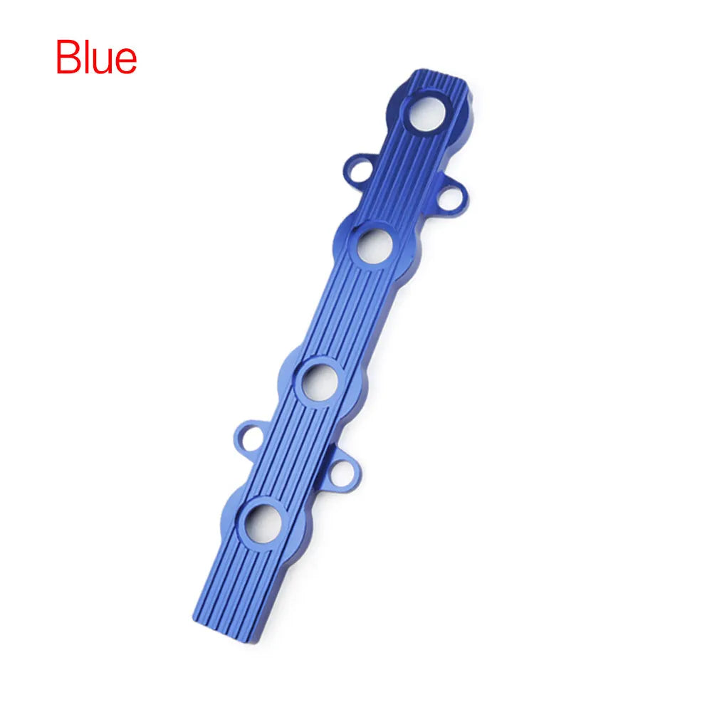 Aluminium alloy car engine wiring harness housing in blue, red, and silver colours