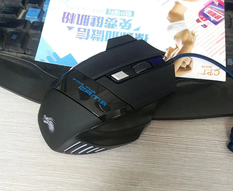 Precision Gaming Mouse with 7-Color LED Backlighting and 5500 DPI Optical Sensor for Immersive PC and Laptop Gaming