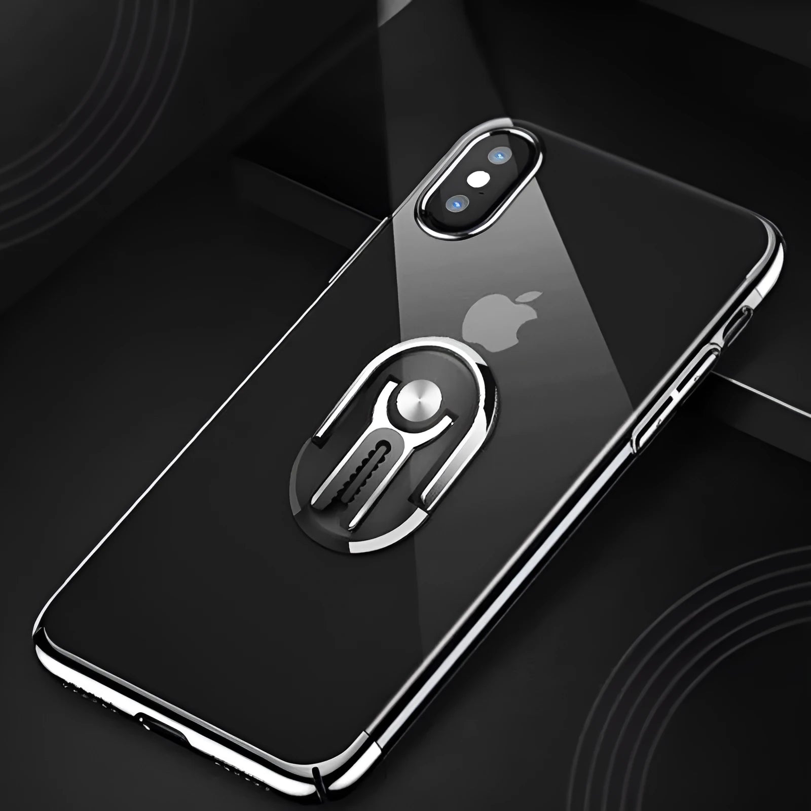 Black universal mobile phone bracket with suction cup and adjustable arm mounted on a car windscreen