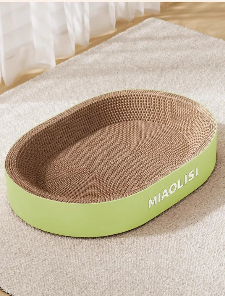 Green oval corrugated paper cat scratch board with 55cm diameter and integrated cat nest