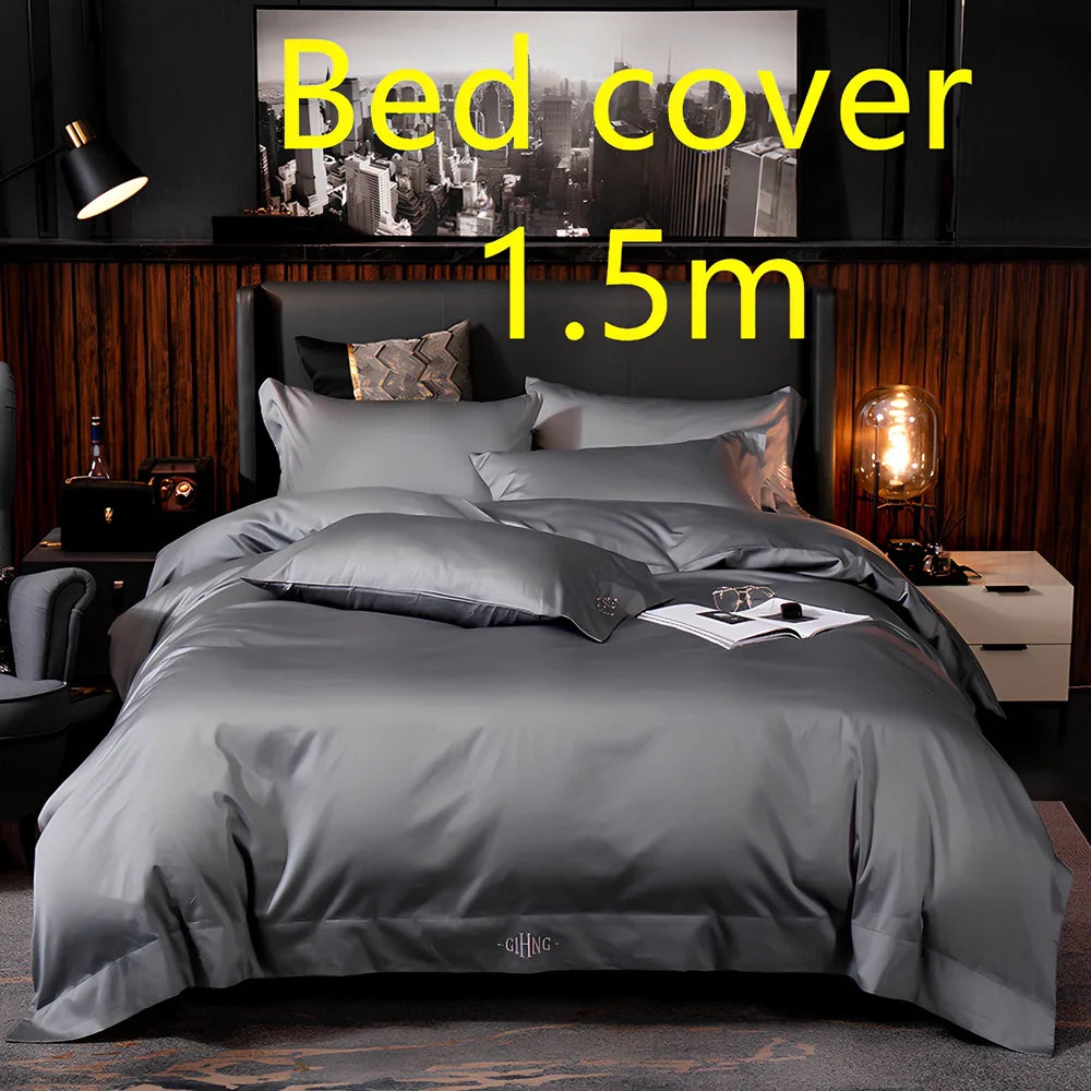 Four-piece quilted cotton bed set in royal blue, showing 200x230 cm cover and 48x74 cm pillowcases for 1.5m bed