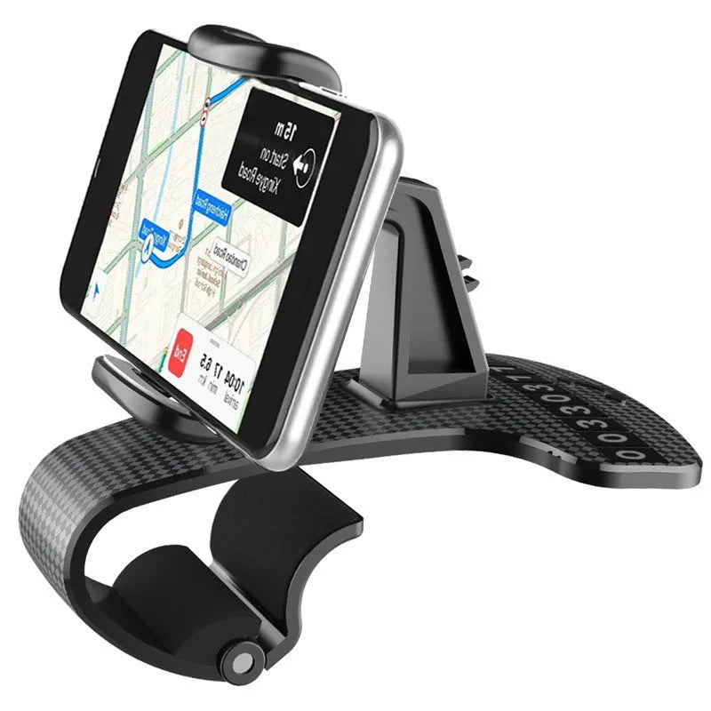Black universal car phone holder with 360-degree rotating head on a car dashboard.