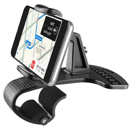 Black universal car phone holder with 360-degree rotating head on a car dashboard.