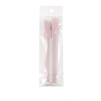 Retractable silicone cosmetic spatula extended to 15cm with scraper tool for product application