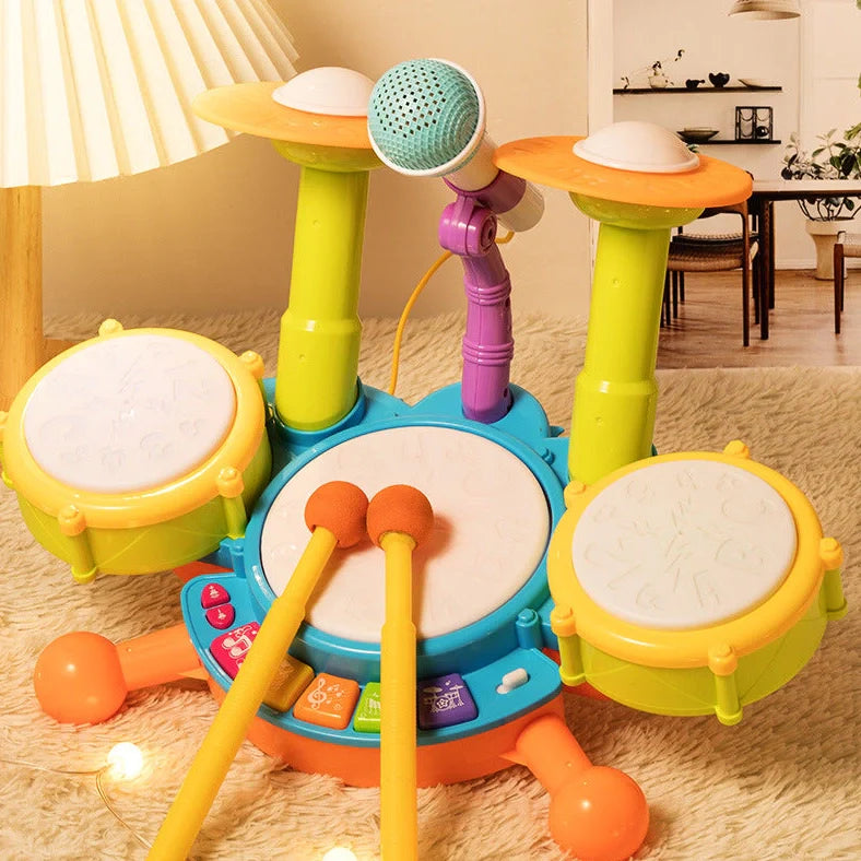 Yellow plastic children's hand-tapping drum toy with electronic sound activation