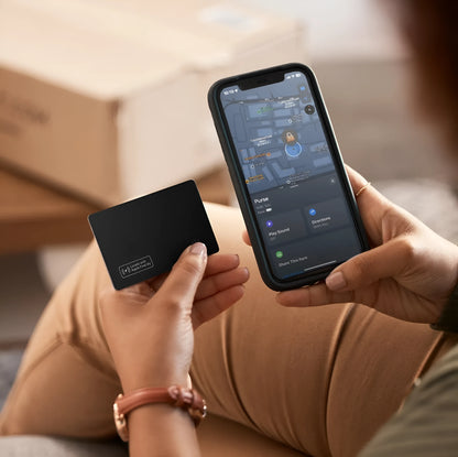 Black ultra-thin anti-loss tracking card next to credit card showing 2.5mm thickness comparison