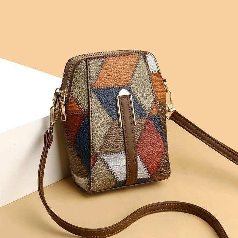 Premium PU leather shoulder bag with trendy stitching details, available in irregular blue with brown or black color options