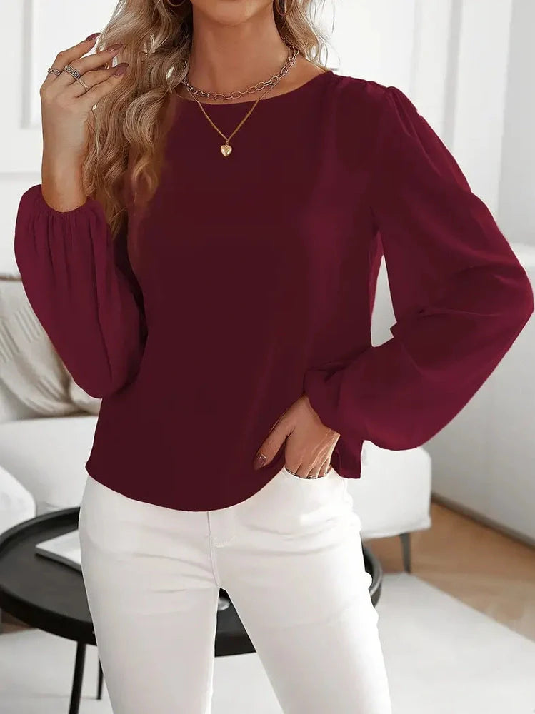 Wine red polyester long sleeve pullover top with button detailing on front, regular fit for commuting wear
