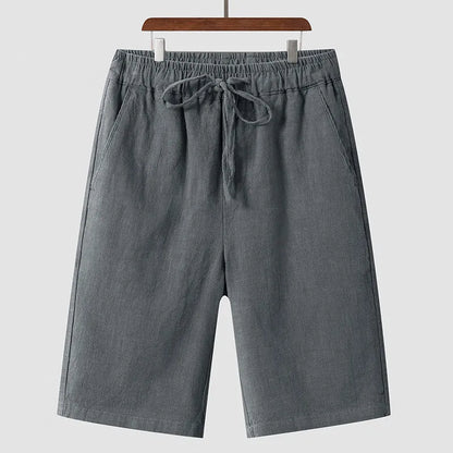 Men's linen casual shorts with elastic waistband in loose cropped design showing beige colour option
