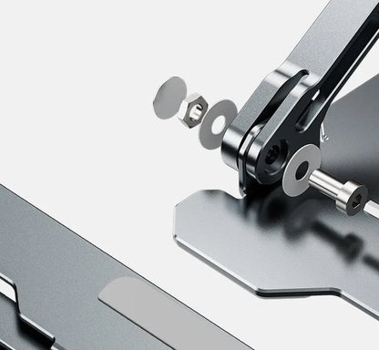 Grey aluminium alloy laptop stand with adjustable angle and folding legs for portable use