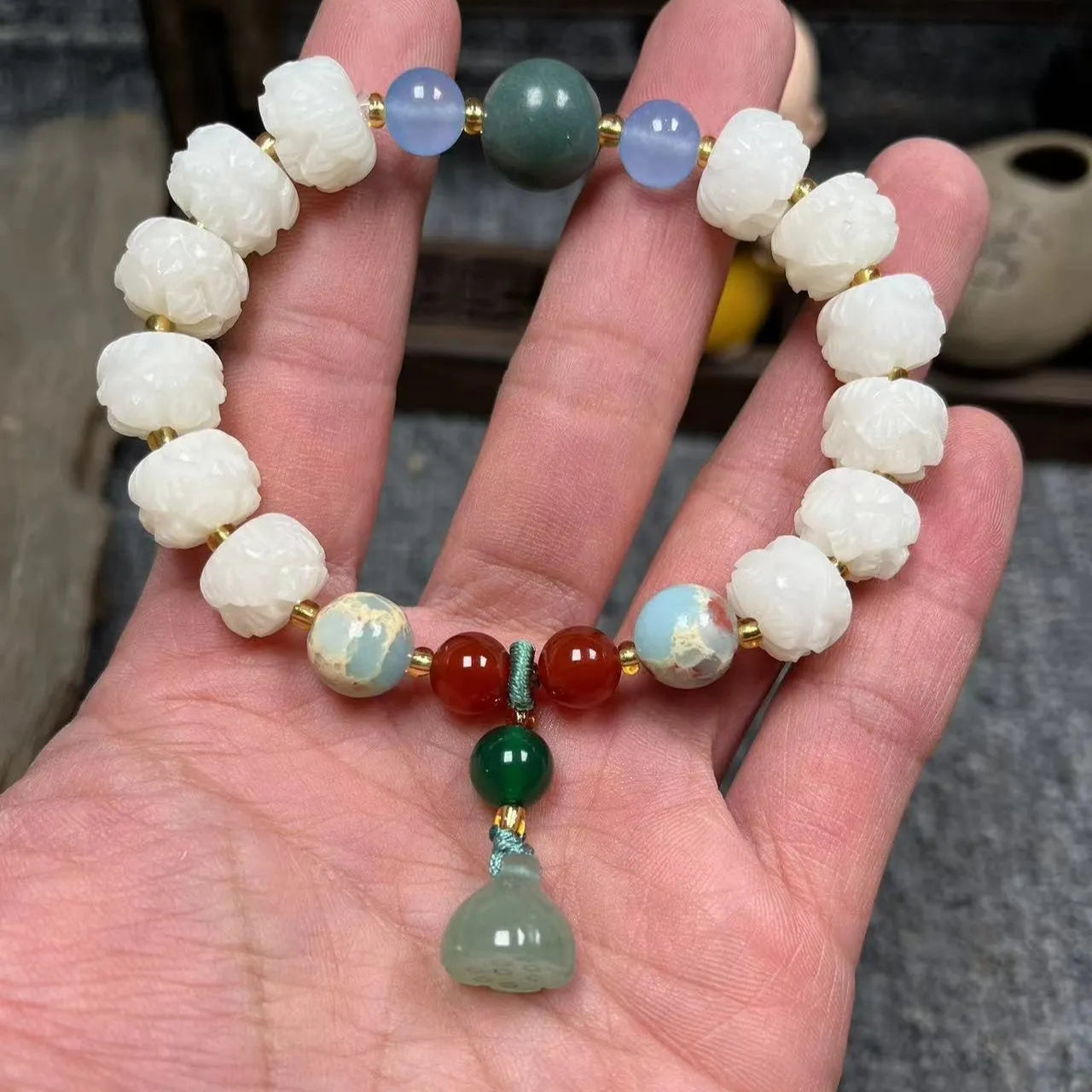 White Bodhi root bracelet with carved pumpkin lotus beads including Apple Orchard and Duobao styles