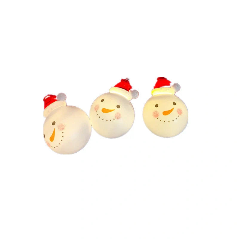 Festive Navidad LED string lights in Snowman, Snow Ball, and Santa Claus colors for holiday decorations