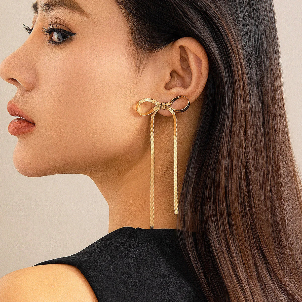 Elegant hypoallergenic 18k gold plated bow earrings for sensitive ears