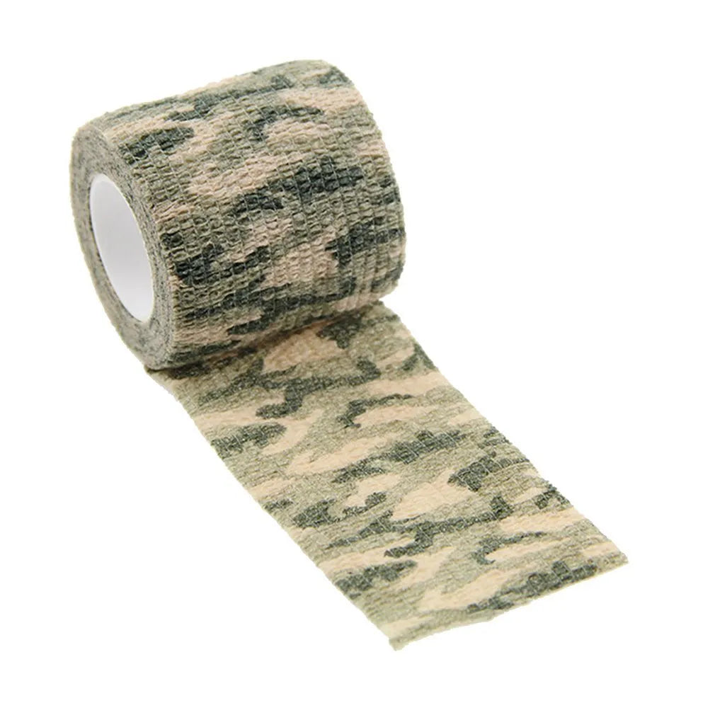 Roll of non-woven elastic camouflage bandage tape in a forest pattern, 4.5 metres long and 5cm wide.