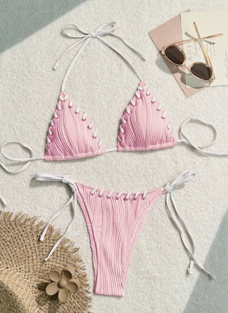 Women's solid colour polyester bikini with eye rope detail, briefs style, sizes S M L