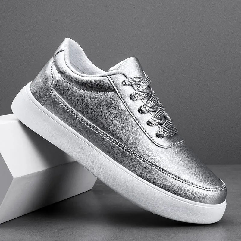 Women's lightweight leather flat casual shoes in gold colour with front lace-up design on a white background
