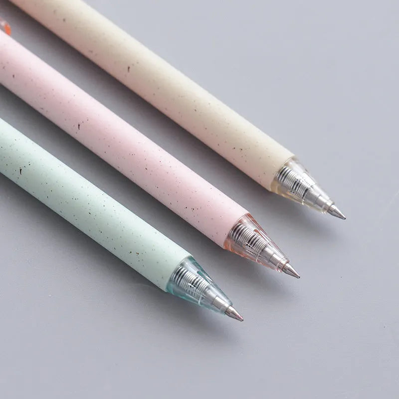 Set of 12 coloured 0.5mm gel pens with black ink and press-button tops on a white surface.