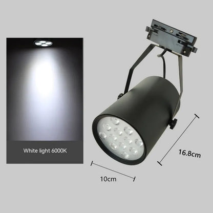LED track spotlight with aluminium shell in black or white finish, mounted on a lighting track.