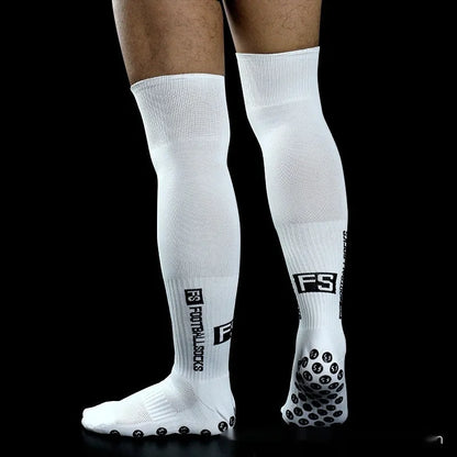 Anti-slip dispensing knee-length football socks in polyester, available in ten colours including black, white, red, and blue.