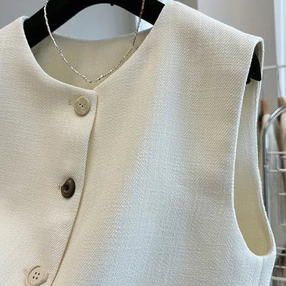 Women's round-neck sleeveless bandage vest in milky white, shown on a model.