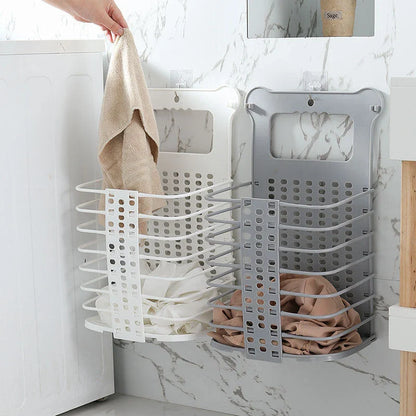 Foldable laundry basket made of sturdy polypropylene material, featuring hooks for wall-mounting and a collapsible design for compact storage.