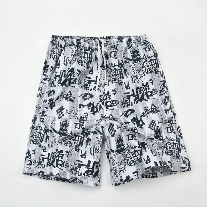 Men's floral printed swimming trunks in polyester fabric showing multiple pattern options for beach and pool use