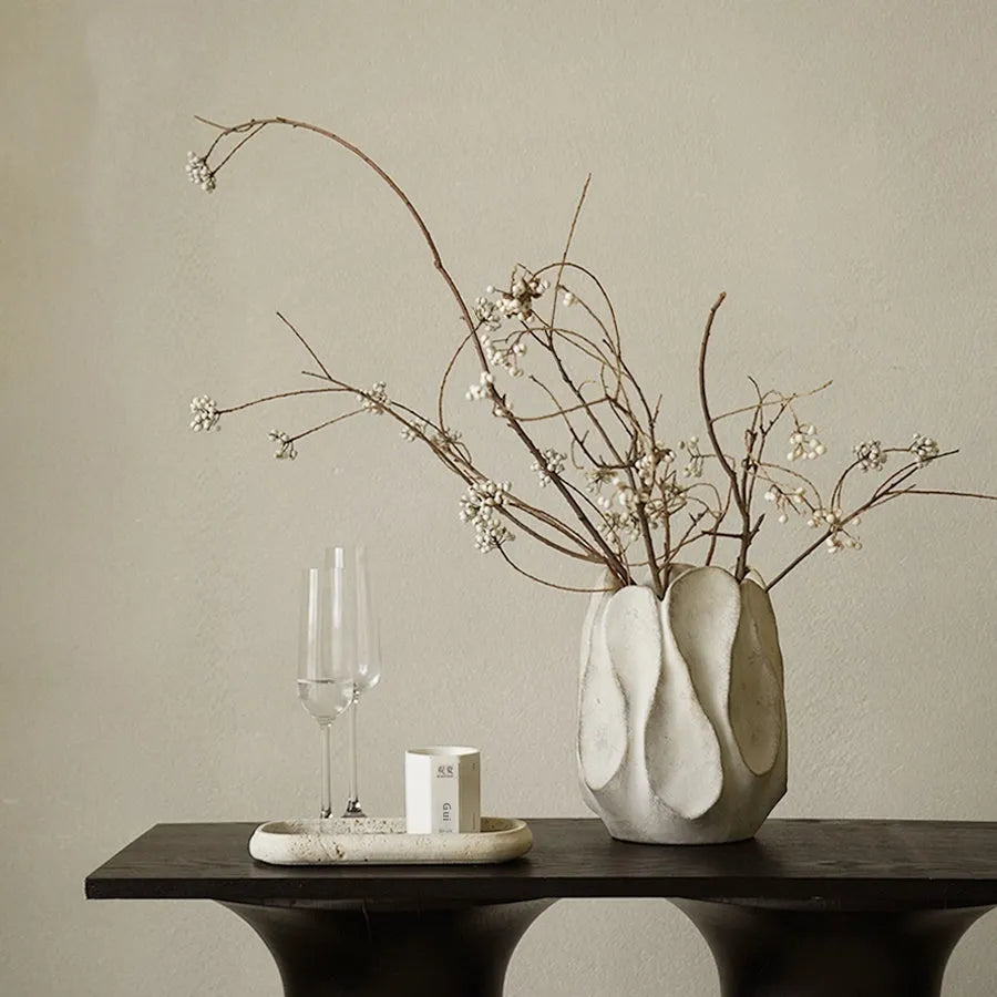 Handcrafted irregular ceramic vase with asymmetrical shape made from magnesium clay for flower arrangements