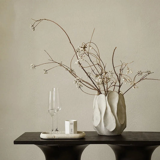Handcrafted irregular ceramic vase with asymmetrical shape made from magnesium clay for flower arrangements