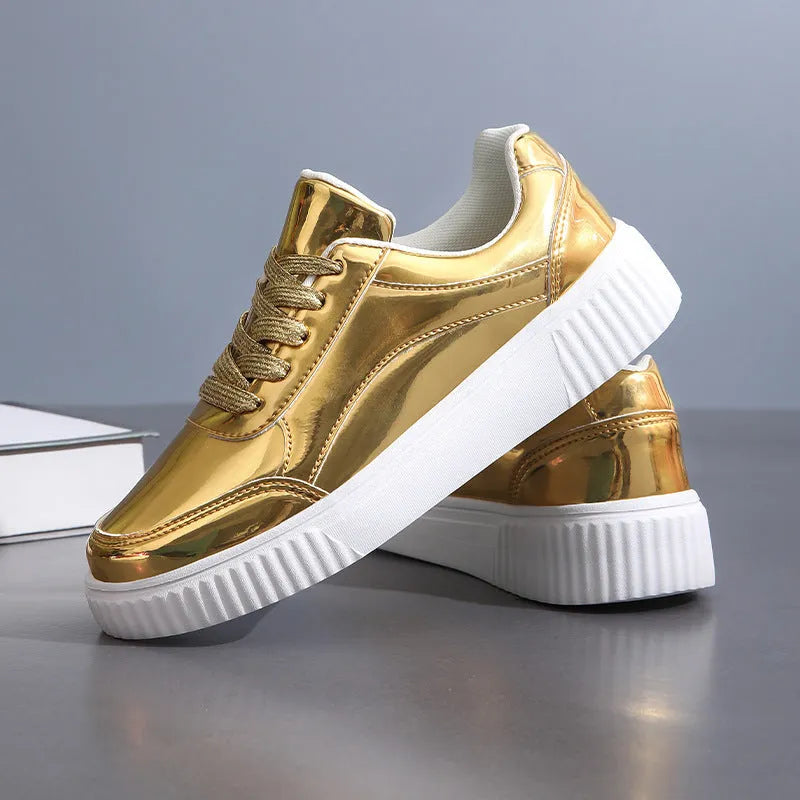 Rose gold and gold sequin platform sneakers with thick soles and round toe on a white background.