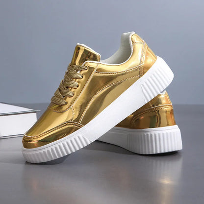 Rose gold and gold sequin platform sneakers with thick soles and round toe on a white background.
