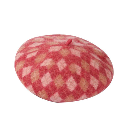 Wool plaid beret with dome crown, adjustable size, and tassel and mesh detail in blue light coffee plaid.