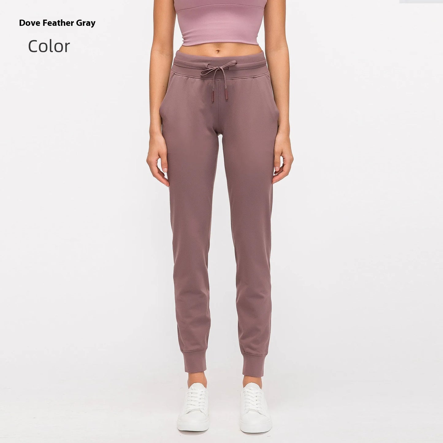 Women's high waist yoga pants with drawstring waistband in Belgian blue colour, showing stretch fabric during yoga pose