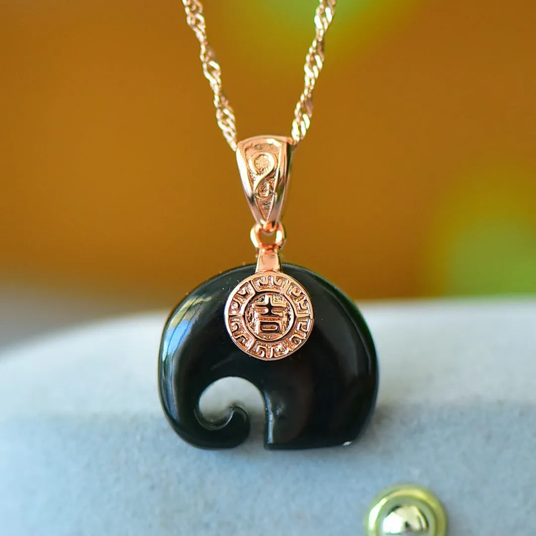 Flat grey Hetian Jade pendant with ink blue jade details and copper inlay on a necklace chain