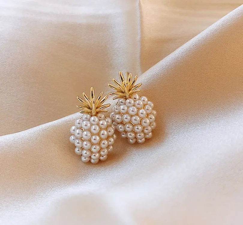 Korean-style women's pineapple starfish pearl alloy earrings with gemstone details in gold, pearl flower, silver, and starfish pearl colours.