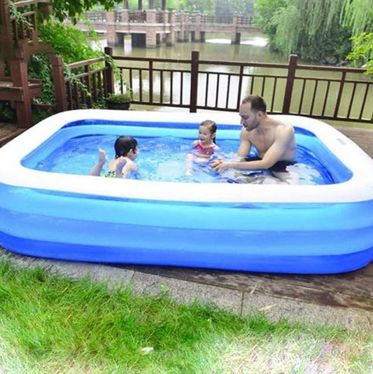 Large rectangular blue paddling pool measuring 200cm long × 150cm wide in garden setting