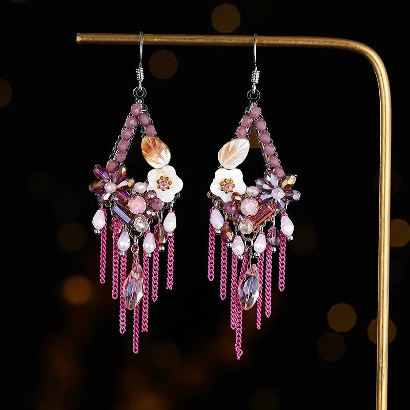 Hand-woven bohemian long earrings with artificial crystal detailing in red and black, champagne, or amethyst colours