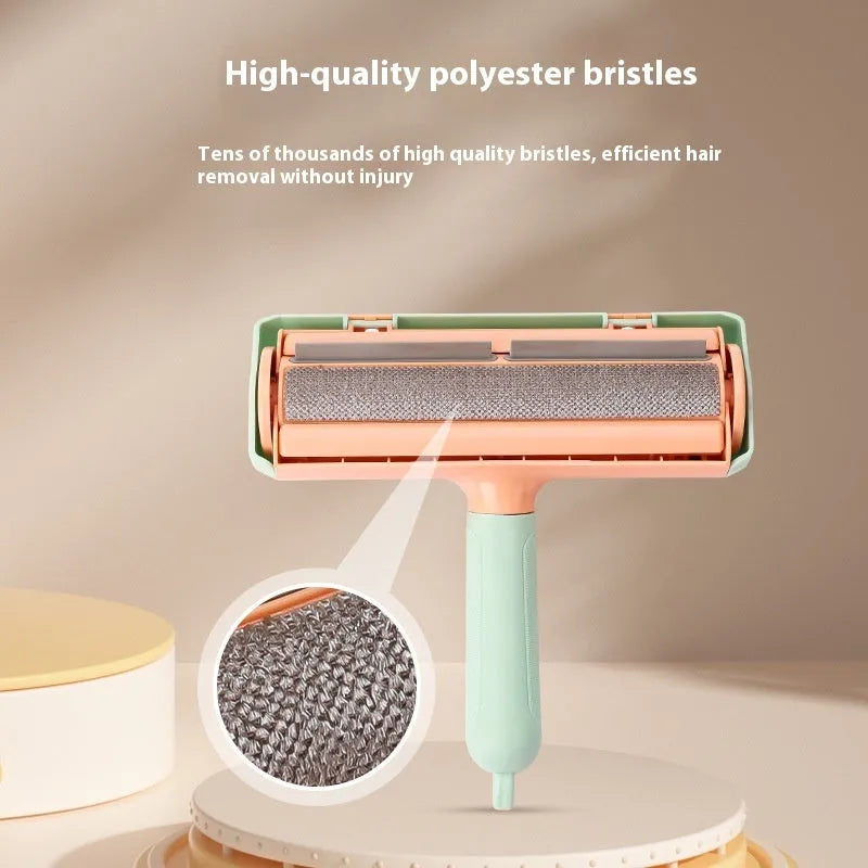 Mint green plastic cat hair removal brush with an ear-style handle on a fabric sofa.