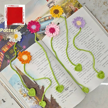 Hand-crocheted wool bookmark with flexible wire core and Little Daisy design in milk cotton yarn