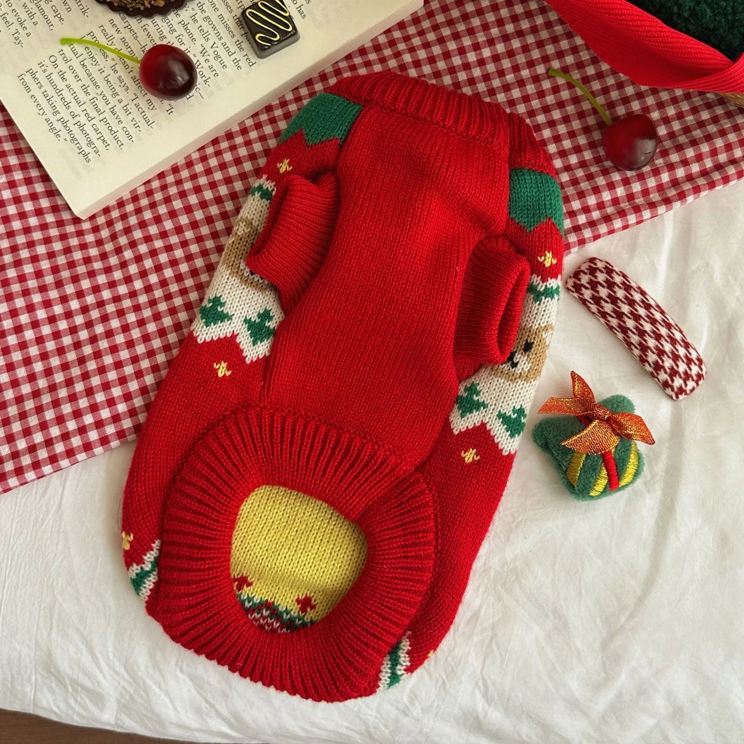Red Christmas cherry pattern pet sweater for small to medium dogs and cats on mannequin