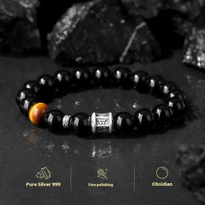 Men's black obsidian prayer wheel bracelet with hand-woven construction and 10mm beads