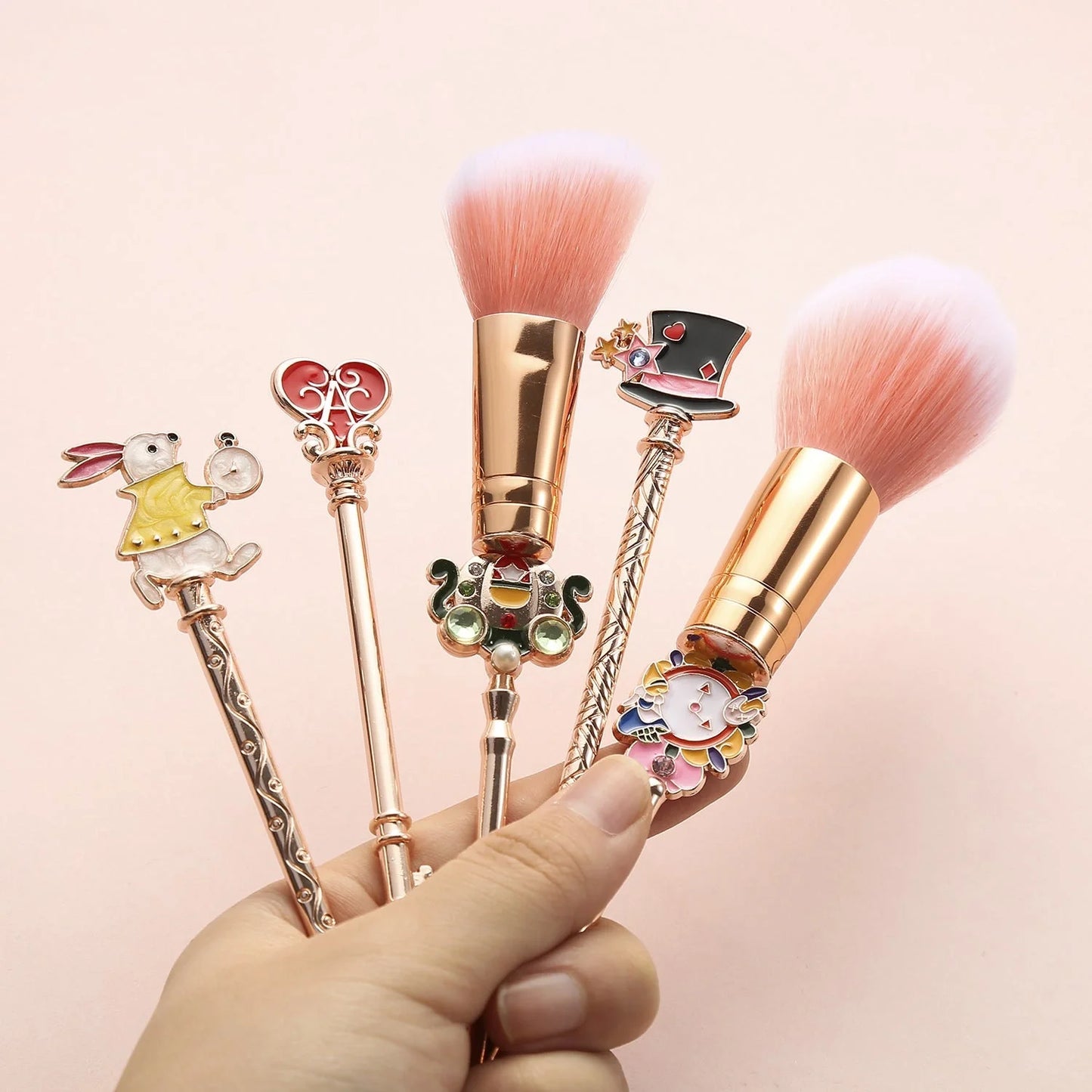 Alice makeup brush in rose gold and gold for precise makeup application