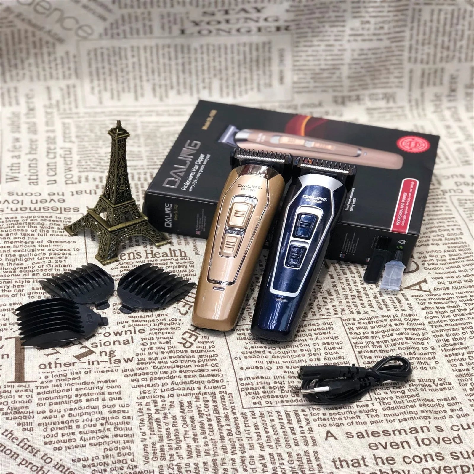 Dark blue rechargeable electric hair clipper with stainless steel adjustable blades on white background
