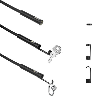 Wireless dual-lens inspection endoscope with IP68 waterproof probe, magnet, and hook accessories on a table.