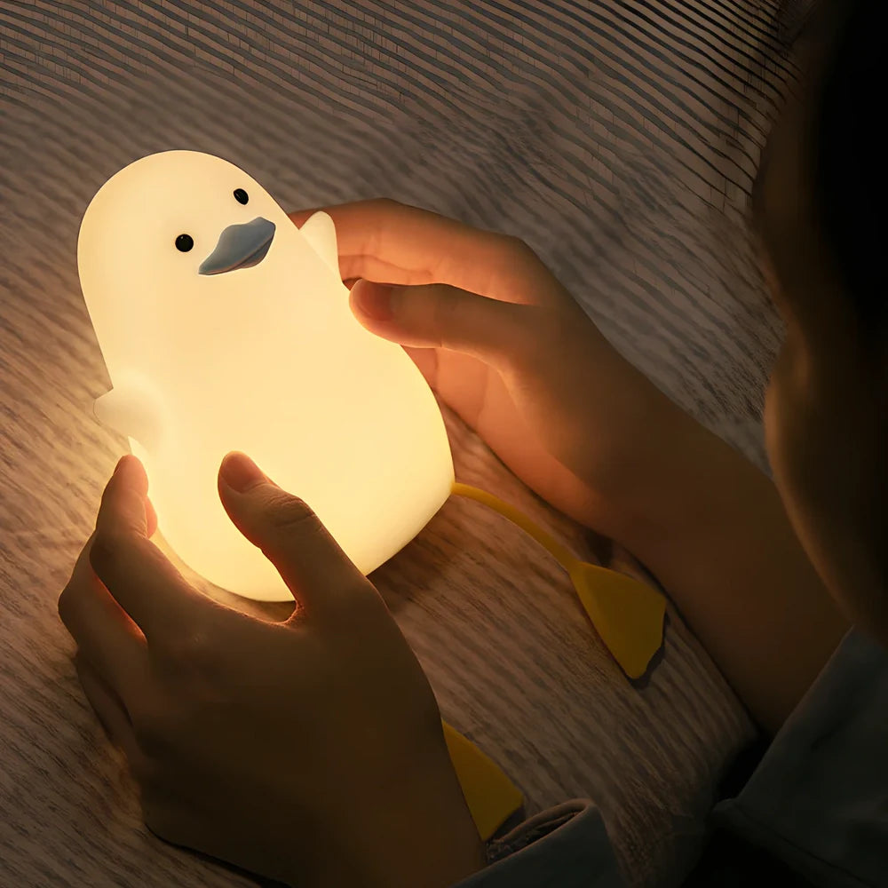 Seagull-shaped silicone night light in blue or yellow measuring 96.5×91×130mm with tap controls