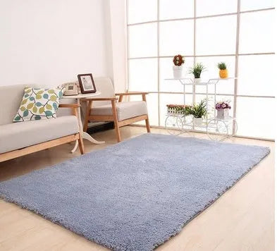 Solid colour plush area rug showing velvet pile texture and rectangular shape