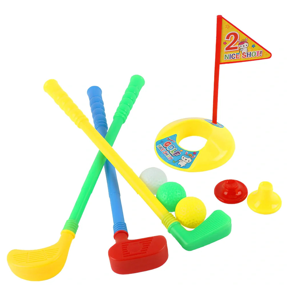 Children's golf set with three clubs, three balls, putting hole with flag, and adjustable tees on green surface